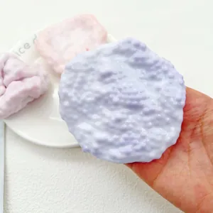 Close-up of a lavender handmade pearl ice skin squishy toy with bubble texture