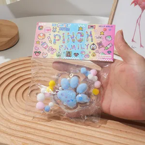 Soft blue cat paw squishy fidget toy in cute packaging for stress relief and fun