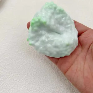 Macro view of handmade creamy white pearl texture squishy toy showing tactile details