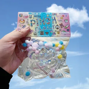 Soft transparent crystal cat paw pinch toy with colorful pom-poms and sequins for stress relief