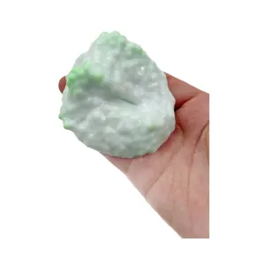 White and green pearl textured handmade squishy ball stress relief toy for relaxing.