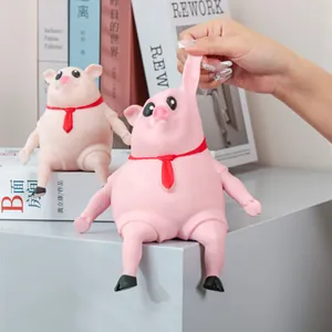 Divertido juguete antiestrés de cerdo rosa con decoración de corbata roja relajante