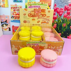 Macro view of macaron squishy toys showing soft texture and cream sandwich detail