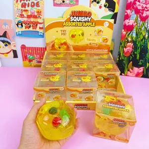 Jumbo-Apfel-Squishy-Spielzeugset in der Displaybox mit einer weichen, gelben Textur