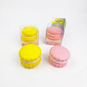 Colorful macaron-shaped slow rebound squishy stress relief toys in yellow and pink