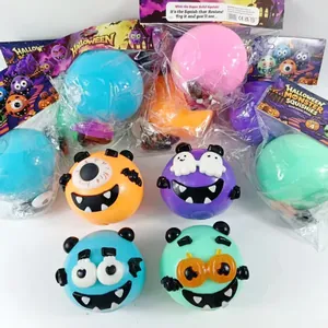 Close-up detail of colorful Halloween monster squishy toys set with retail packaging