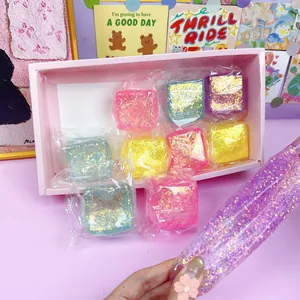 Detailed view of the stretchable texture and glitter filling of the squishy toy.