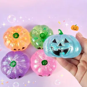 Vibrant glittery Halloween pumpkin squishy toy for stress relief and festive decoration