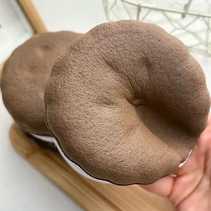 Macro detail view of realistic chocolate cookie squishy toy with slow rebound texture