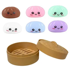 Set of colorful cute bao bun squishy toys with a toy steamer for stress relief