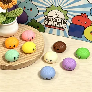 Close-up of colorful cartoon dumpling squishies from the mystery countdown box