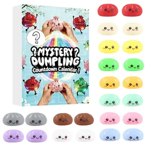 Mystery dumpling squishy countdown calendar set with colorful fidget toys and gift box.