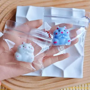 Detail of mini hamster squishy toys in clear plastic zip bags with ball chains