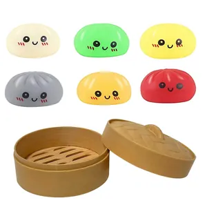 Colorful bun squishy fidget toy set with a mini steamer basket