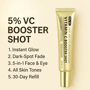 Detailed macro view of 5% Vitamin C booster shot face and eye cream in a gold squeeze tube