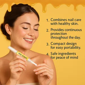 Close-up of a woman applying organic nail repair oil pen to her fingernails.