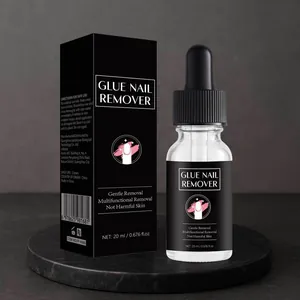 Professional 20ml glue nail remover bottle and packaging box macro detail view
