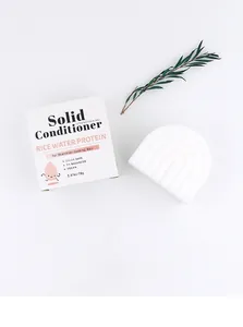 Close-up of a white rainbow-shaped rice water conditioner bar and its packaging