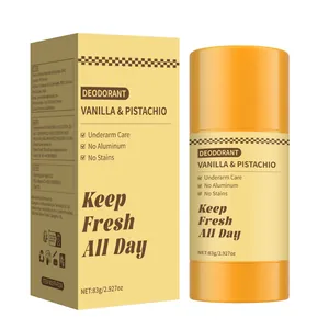 Vanilla and pistachio deodorant stick shown with its yellow product packaging box