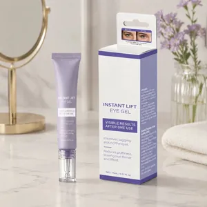 Gel liftant instantané pour les yeux 15 ml avec boîte sur marbre, miroir et lavande