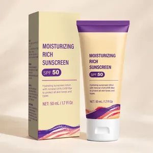 Close-up detail of moisturizing SPF 50 sunscreen lotion tube and protective paper box