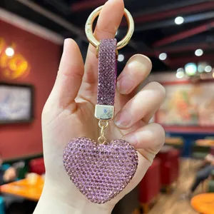 Detail view of purple rhinestone heart keychain with sparkling crystal embellishments