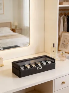 Eleganter Uhrenkasten aus schwarzem PU-Leder mit 6 Fächern auf einer modernen Kommode