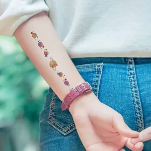 Vibrant cartoon planet temporary tattoo stickers with solar system space design for kids