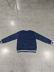 Back view of navy blue American retro baseball jacket with white striped ribbing