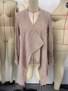 Detailed view of a pink ribbed knit cardigan with waterfall hem on a dress form
