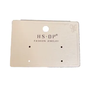 Carte d'affichage de boucles d'oreilles en PVC blanc avec trou pour suspension