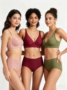 Detailansicht von drei nahtlosen V-Ausschnitt BH und Slip Sets in verschiedenen Farben