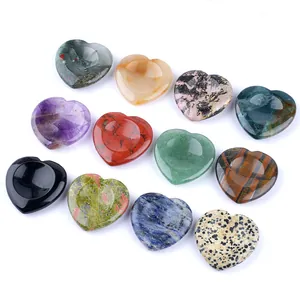 Various 40mm natural crystal heart-shaped thumb worry stones for meditation and healing