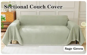 Sage green chenille sectional couch cover detail, cozy living room decor with fringe design.
