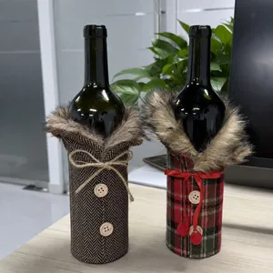 Detail showing plush faux fur trim and buttons on Christmas wine bottle covers.