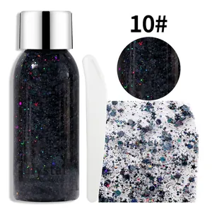 Détail du gel d'ombre à paupières pailleté sombre avec étoiles et applicateur blanc