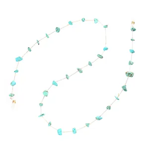 Close-up detail of a handmade turquoise beaded glasses chain with anti-slip rubber loops.