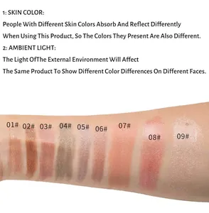 Color swatches of 9 different shades of waterproof pearl eyeshadow sticks on arm skin