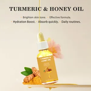 Close-up detail of turmeric & honey essential oil bottle with golden liquid dropper
