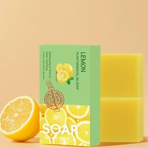 Set de savon artisanal au citron avec emballage vert frais et deux savons de 100g.