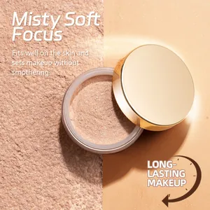 Close-up of loose setting powder with misty soft focus and long-lasting finish.