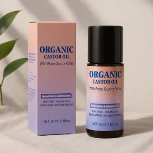 Dettaglio flacone e scatola di olio di ricino bio 50 ml con applicatore roller al quarzo