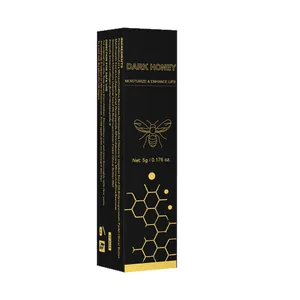 Rossetto idratante Dark Honey per la cura delle labbra in elegante scatola nero-oro