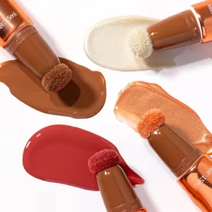 Detail of liquid blush and highlighter sticks with sponge applicators and swatches