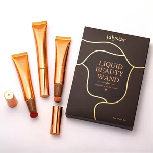 Detailed view of Julystar liquid beauty wands with sponge applicators and gift box.