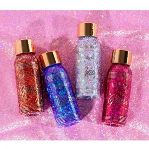 Vista dettagliata di quattro gel glitter Julystar su un tessuto rosa brillante.