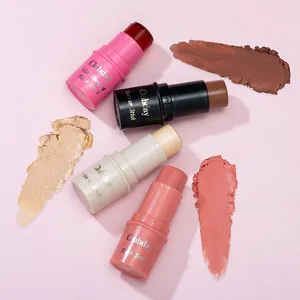 Detailed view of matte blush, contour, and highlighter sticks with smooth cream swatches