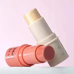 Macro view of matte blush stick and pearl shimmer highlighter duo