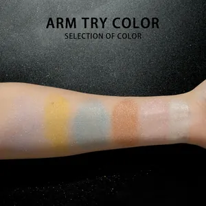 Glittery arm swatches of multi-color shimmering highlighter powder set for face and body