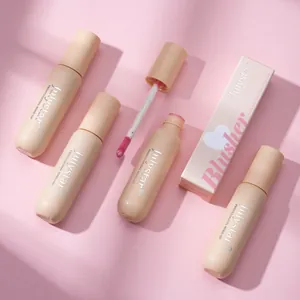 Macro view of Julystar pearlescent blush fluid applicator and sleek packaging